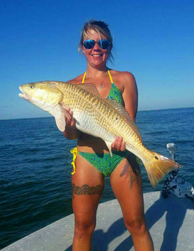 girl-huge-fish-on-boat