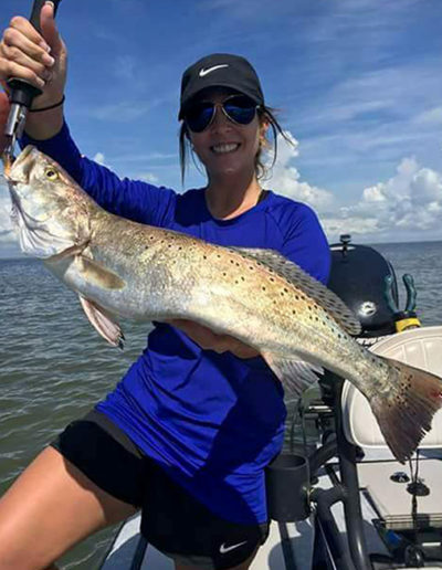 speckled-trout-blue-shirt-woman